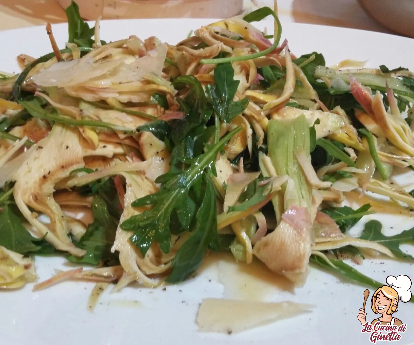 insalata di carciofi con rughetta e parmigiano