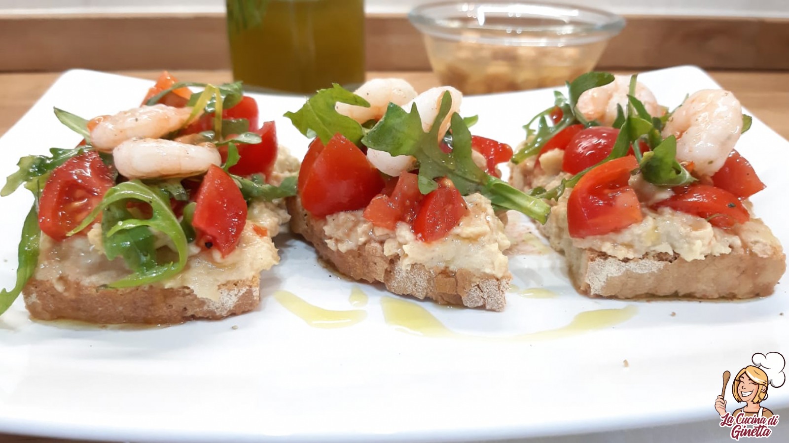 bruschette con crema di ceci e pomodorini