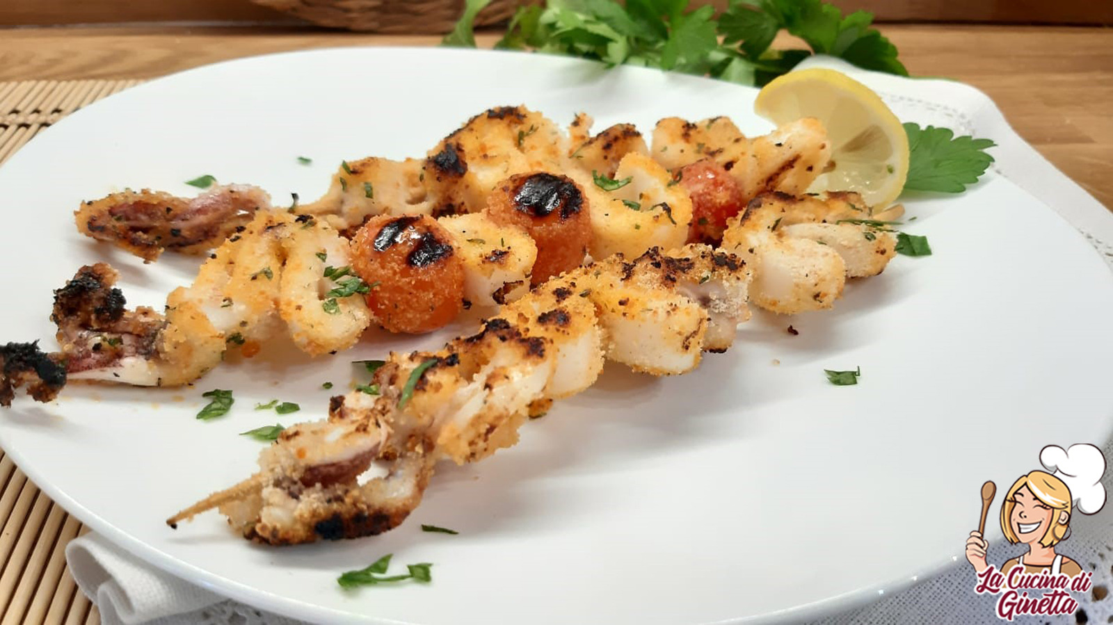 spiedini di calamari panati e grigliati