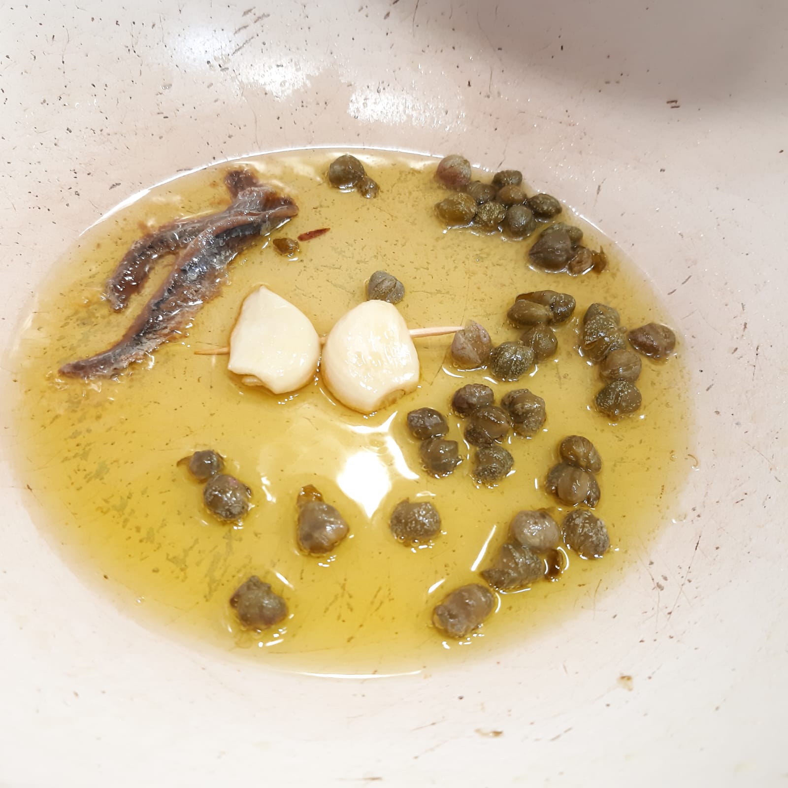 baccalà in salsa di pomodorini capperi e olive