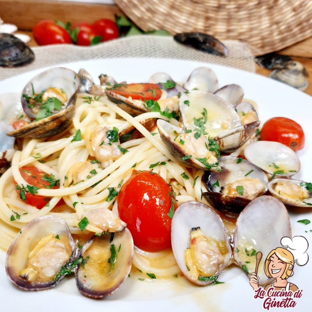 spaghetti con vongole veraci e pomodorini