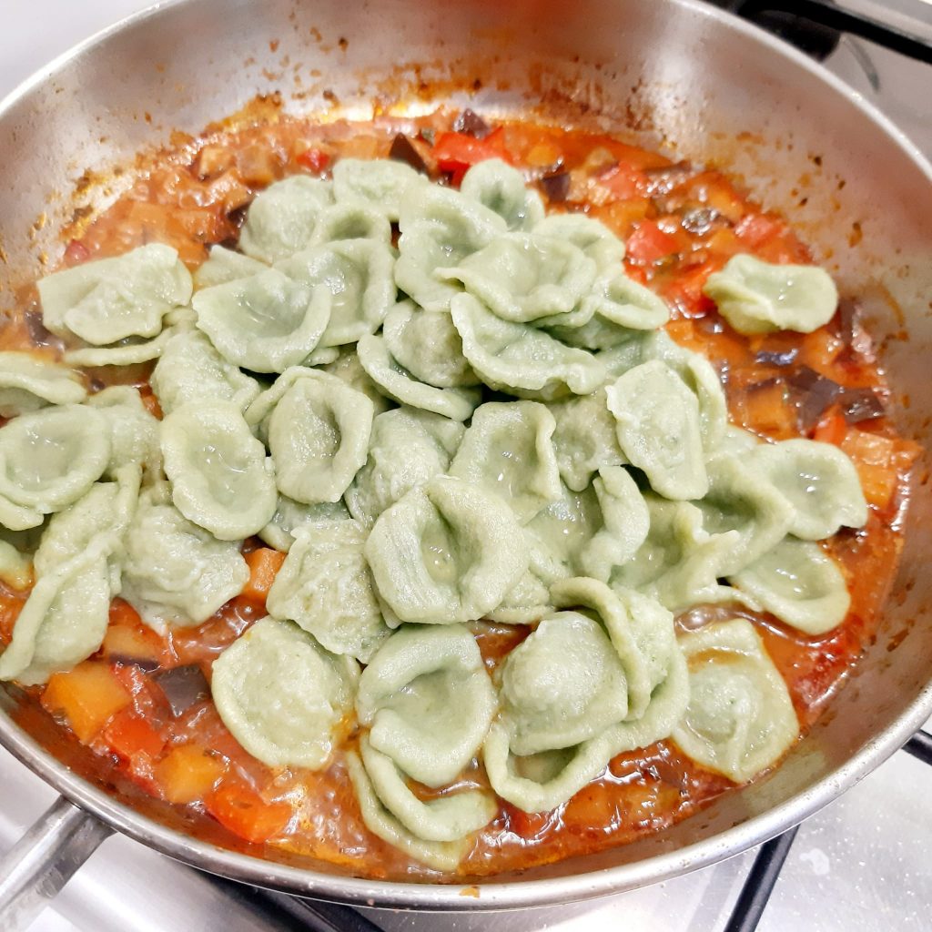 orecchiette con melanzane peperoni e ricotta salata