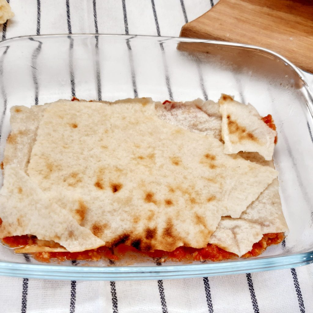 lasagna con pane carasau al ragù di salsiccia